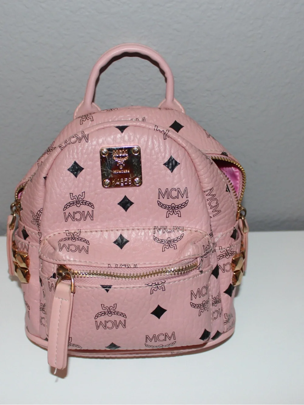 MCM Pink Logo Print Mini Backpack with Gold Hardware